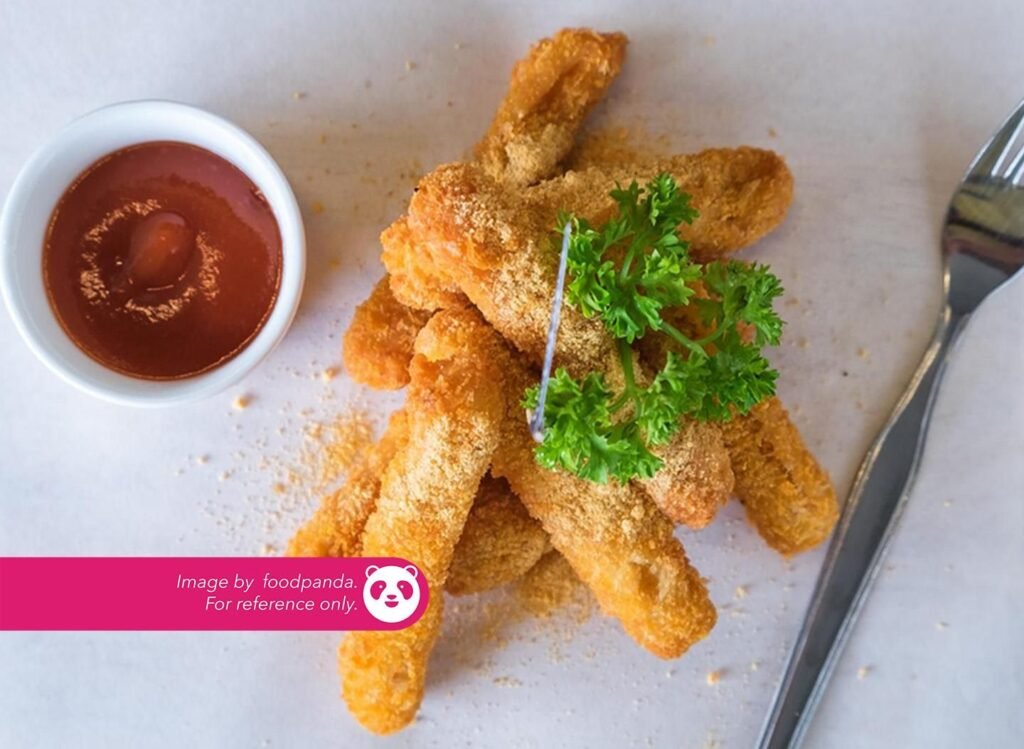 Chicken Cheese Stick ₱ 410 Mixture of chicken shreds, cheese such as cheddar, mozarella, cream cheese with capers & jalapeno wrapped with spring roll paper. Served with garlic yogurt sauce