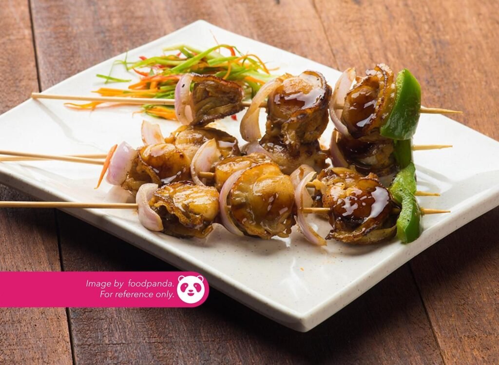 Grilled Scallops ₱ 400 Grilled scallops with garlic butter topped with parmesan cheese, mozarella cheese & bonito flakes served with parmesan garlic corn