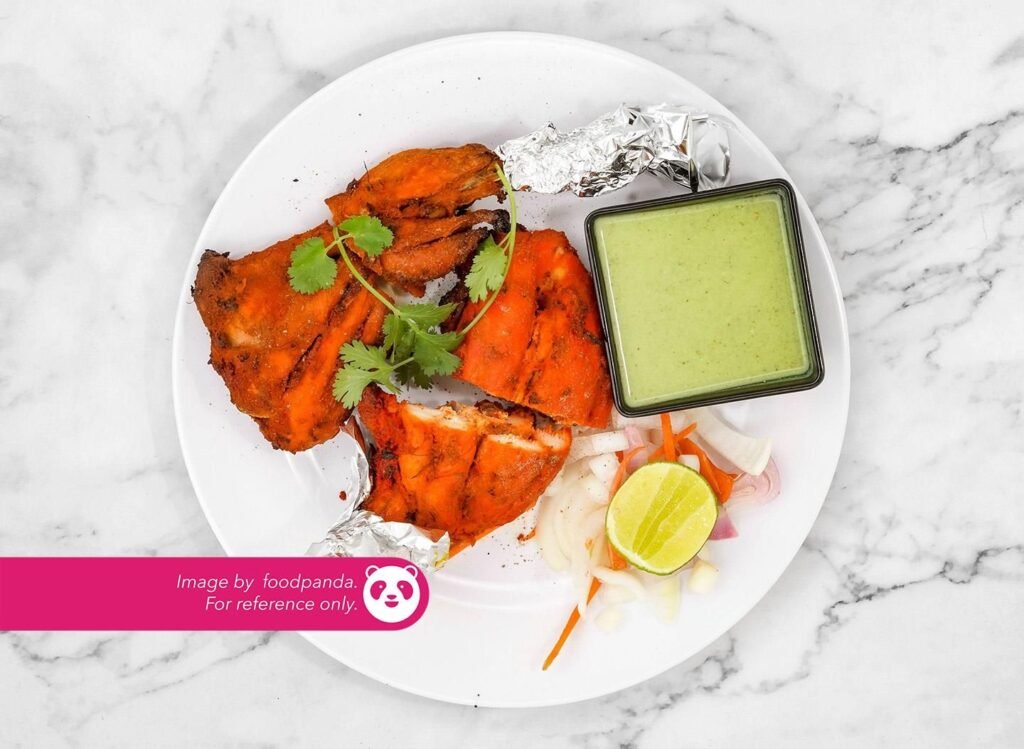 Tandoori Chicken ₱ 240 Boneless grilled chicken thigh mixed with tandoori Indian spice. Served with rice & cucumber raita